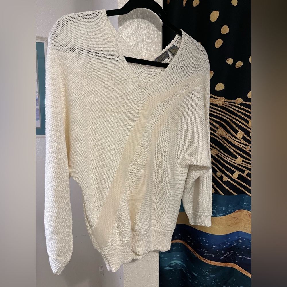 Beautiful new without tags sweater cream color